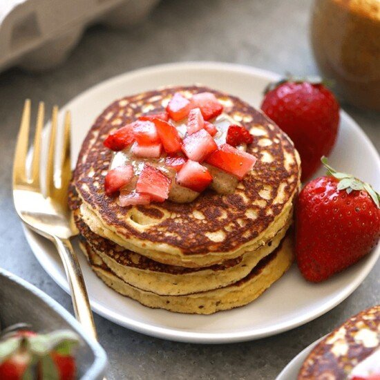 3 ingredient banana pancakes with strawberries on top