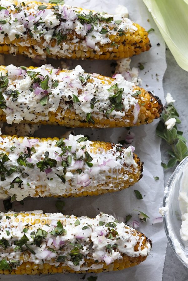 Mediterranean-style street corn with feta and herbs.