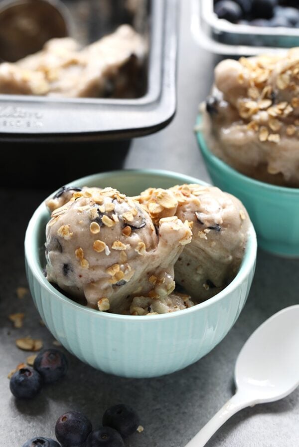 Blueberry ice cream with granola and blueberries.