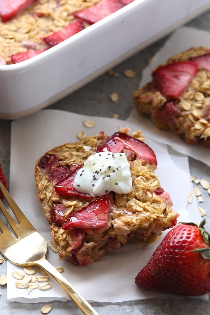 Slice of strawberry rhubarb oatmeal bake ready to be served.