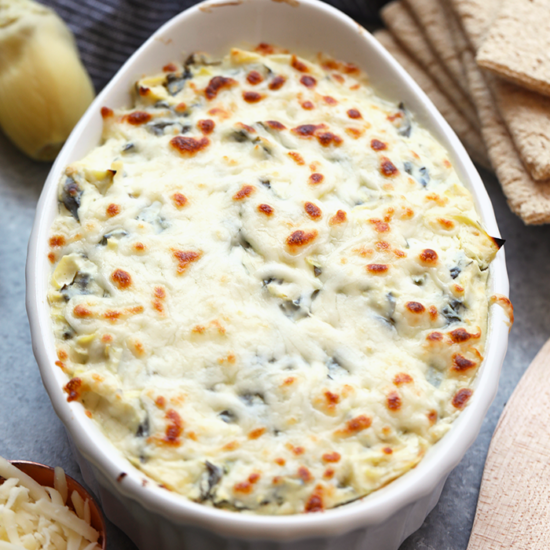 Lightened Up Spinach and Artichoke Dip with crackers.
