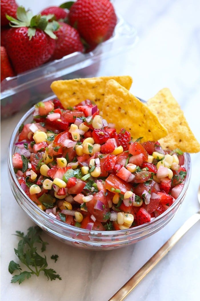 This Strawberry Pico de Gallo is the perfect healthy summer appetizer. It's great with chips, on top of fish, and everything in between. Not to mention it is packed with fruits AND veggies!
