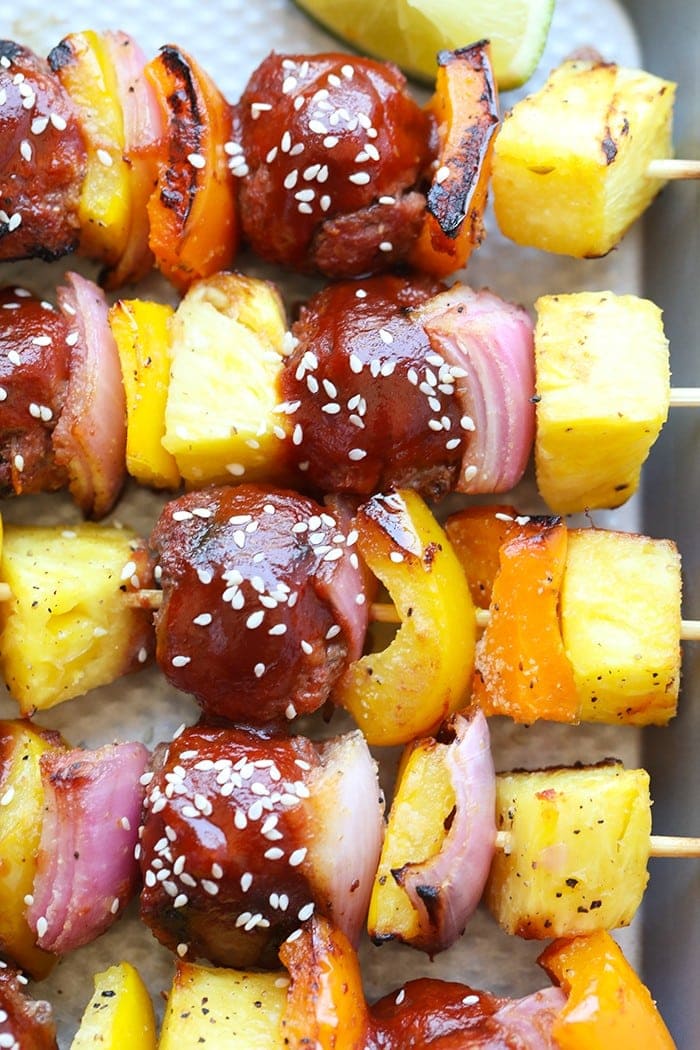 Make a healthy meal on a stick with these amazing Grilled Sweet and Sour Meatball Skewers. The meatballs are made with lean ground beef, grated yellow squash, and ginger with a fantastic healthier sweet and sour marinade. 