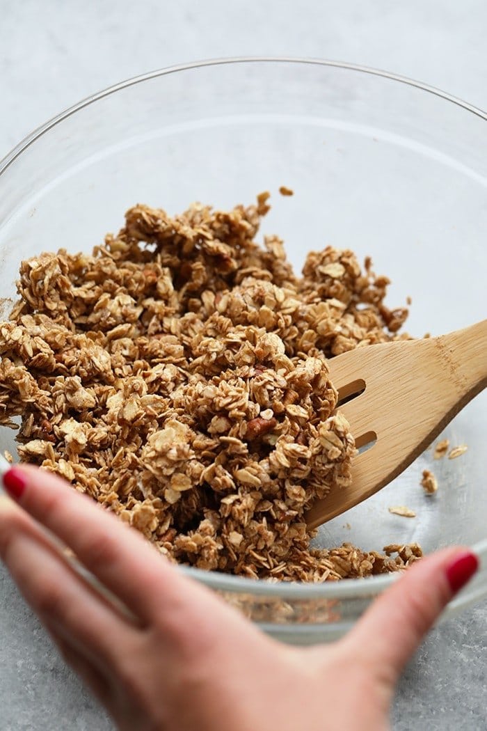 Dessert never tasted so good with this incredible foil pack peach crisp recipe! Made with juicy peaches and a simple crumble topping this summer dessert is healthy and delicious. Crisp topping in bowl.