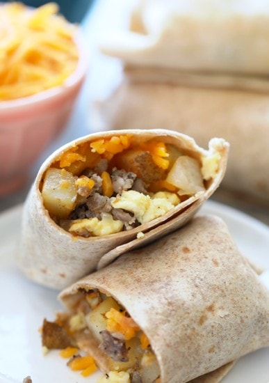 Frozen breakfast burritos with cheese and eggs.