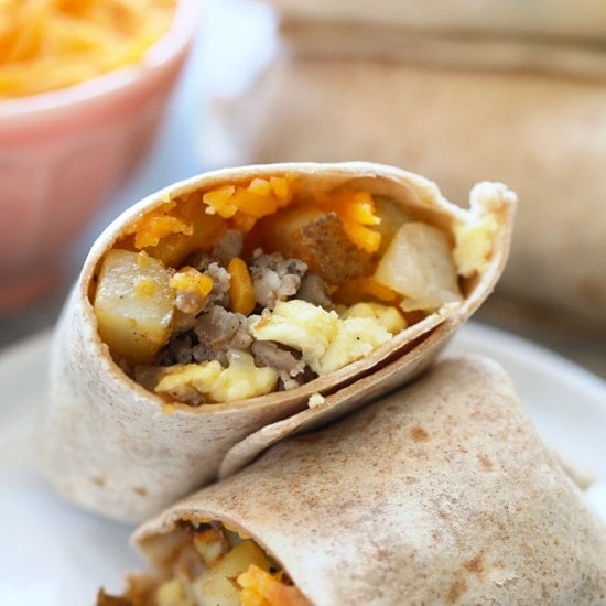 Frozen breakfast burritos with cheese and eggs.