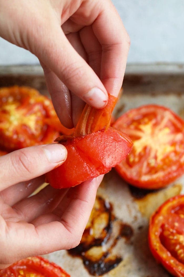 peeling skin off tomatoes.