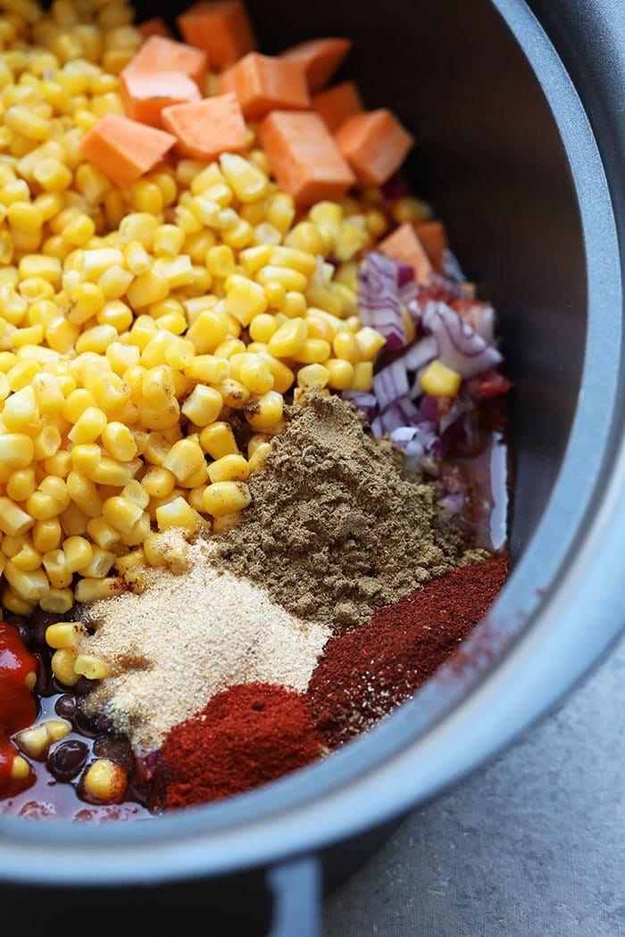 Mexican quinoa ingredients, uncooked, in slow cooker