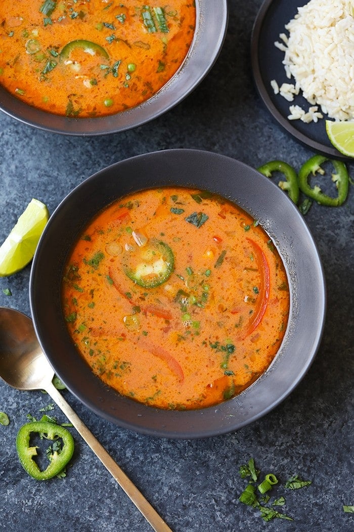 This Spicy Thai Coconut Curry Soup (Vegan!) is the perfect weeknight meal. It is packed with veggies, healthy fats, and a ton of flavor! It's ready in 30-minutes and is great for meal-prep throughout the week. 