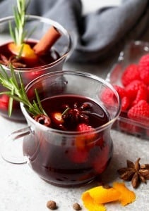 spiced raspberry mulled wine in a glass mug