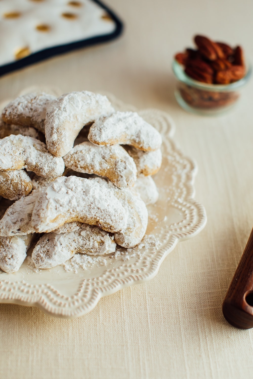These simple almond flour crescent cookies are a healthy take on my Nanny’s signature crescent cookie recipe. They’re vegan + gluten-free and you only need six ingredients!
