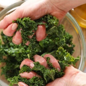 massaging kale in hands