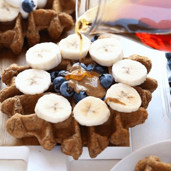 Banana Bread Waffles topped with blueberries and bananas.