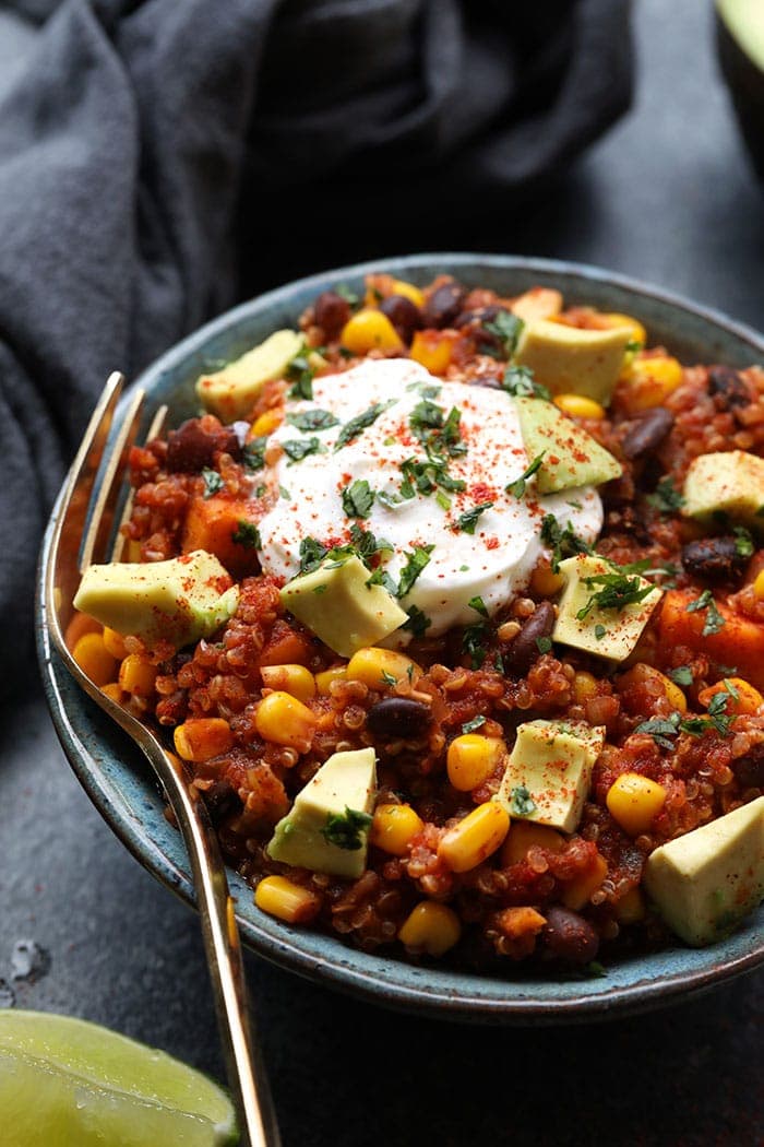 This vegetarian slow cooker meal is so flavorful you won’t even miss the meat! Throw all of the ingredients for this Healthy Slow Cooker Sweet Potato Mexican Quinoa in your crock pot for an easy weeknight dinner that’s vegan, dairy-free, and gluten-free.