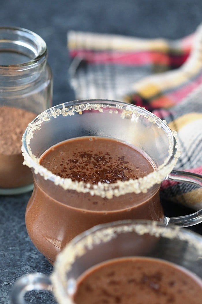 This decadent spiced coconut hot chocolate is made with full-fat coconut milk, a mixture of warm spices, and maple syrup. It's both vegan and paleo-friendly, perfect for the health-minded people out there!