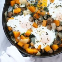A breakfast skillet with butternut squash and eggs.
