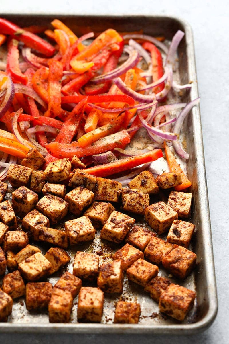 Throw all of your ingredients for this Meal Prep Sheet Pan Tofu Quinoa Burrito Bowls on a baking sheet and you've got a delicious, vegetarian meal ready for the entire week!