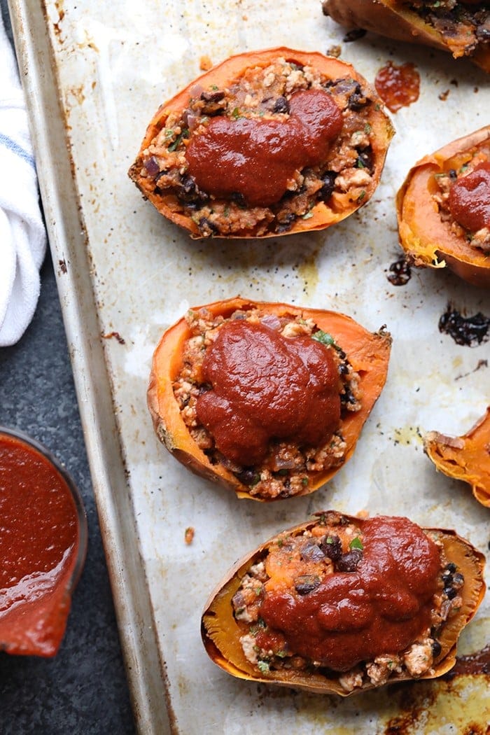 These Twice-Baked Turkey Sweet Potato Enchilada Boats are healthy, packed with nutrients, and a delicious spin on your favorite enchilada flavors! Theys delicious potatoes are perfect for meal-prep or a fun weeknight dinner! 