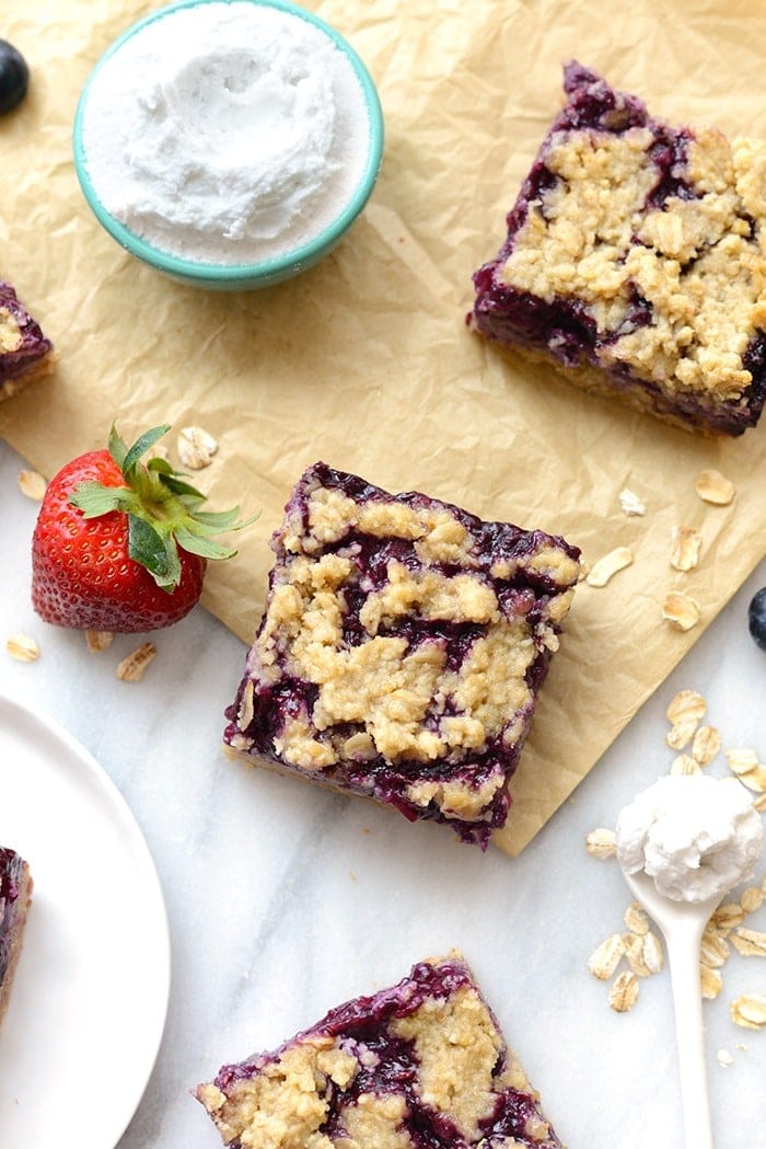 triple berry crumble bars cut into squares