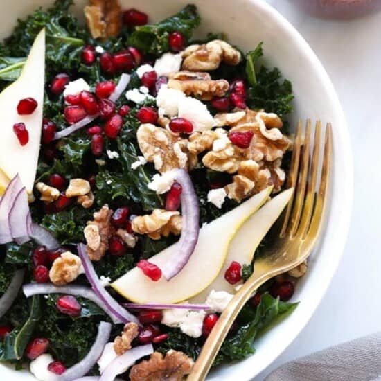 Kale Pomegranate Salad with Pears in a bowl