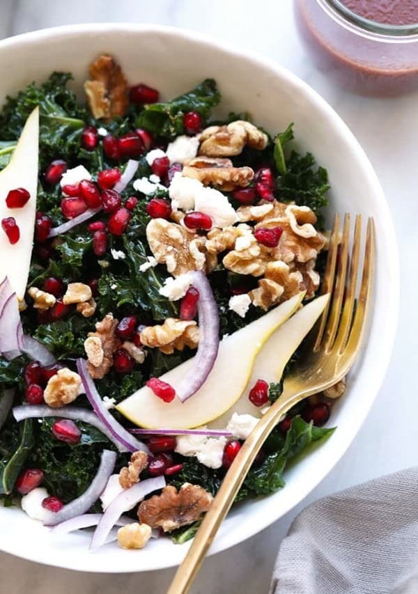 Kale Pomegranate Salad with Pears in a bowl