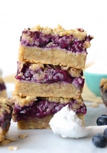 triple berry crumble bars stacked 3 high