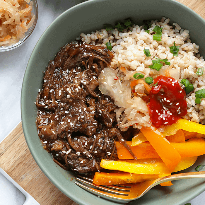 Start your week off right with this Instant Pot Korean Beef Bowl recipe. Your family and friends will absolutely love this meal! It tastes fancy but only takes a couple hours to prepare this fall-off-the-bone shredded Korean beef with your Instant Pot.
