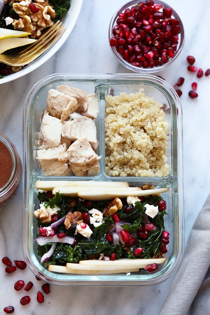 Not only is this kale salad colorful, but it's flavorful too! This Pomegranate and Pear Kale Salad is made with a homemade POM Vinaigrette and topped with fresh pomegranate arils, pear slices, walnuts, and goat cheese. YUM.