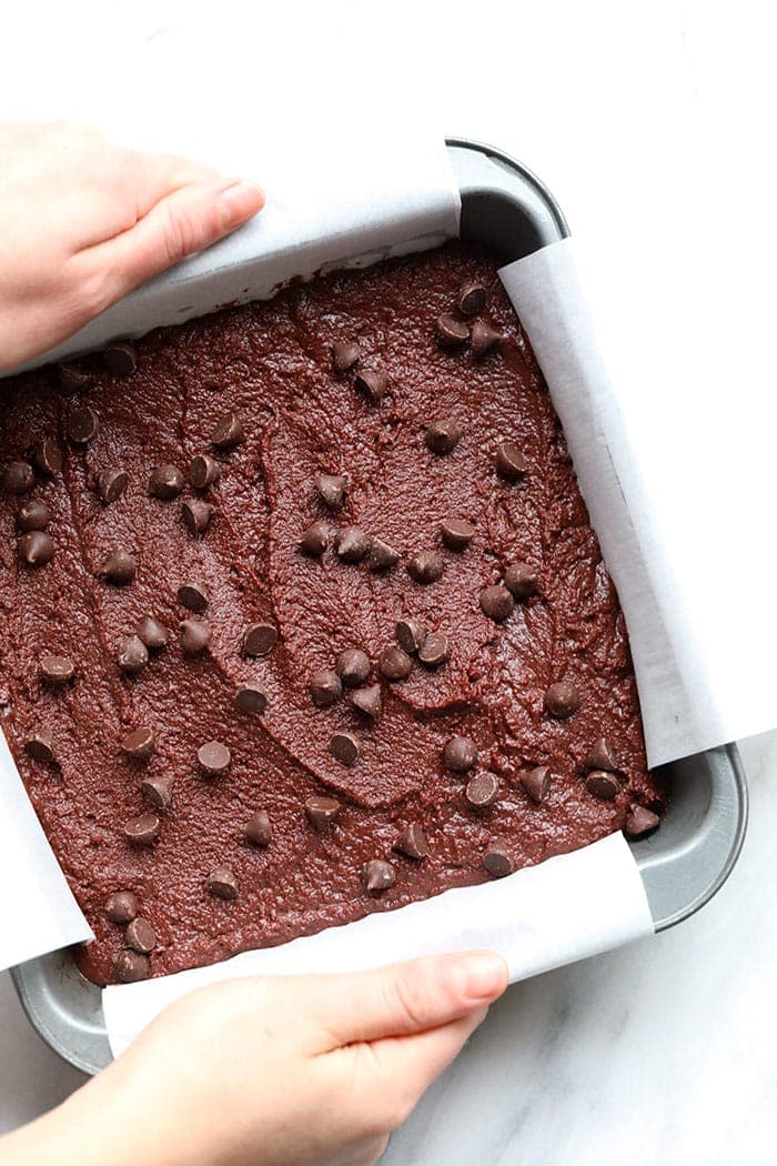 This paleo-friendly coconut flour brownie recipe is fudgy and made with wholesome ingredients that are all gluten-free! There's no oil involved thanks to the secret ingredient of beet puree. That's how this recipe got its name of Sneaky Beet Brownies.