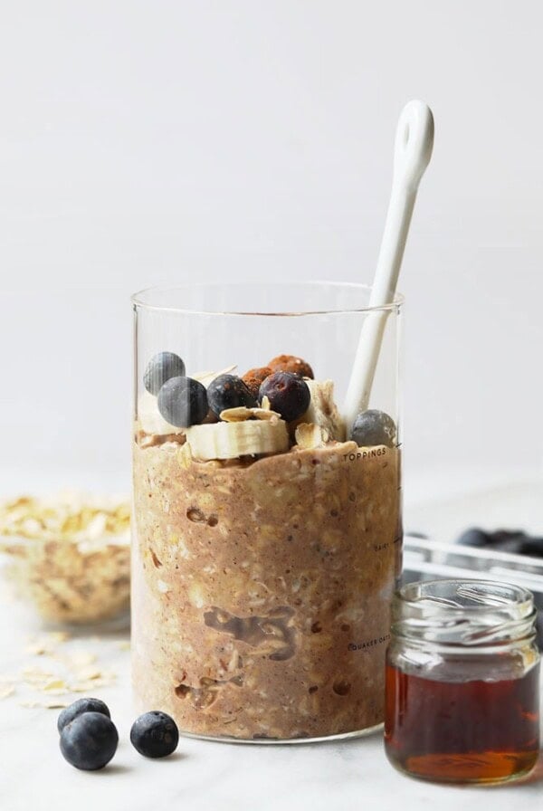 French Toast Overnight Oats topped with blueberries and honey.
