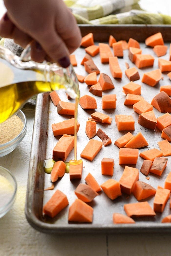 cubed sweet ،atoes with olive oil