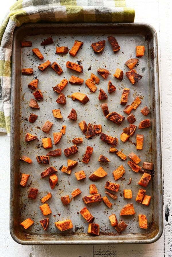sweet potato cubes on baking sheet