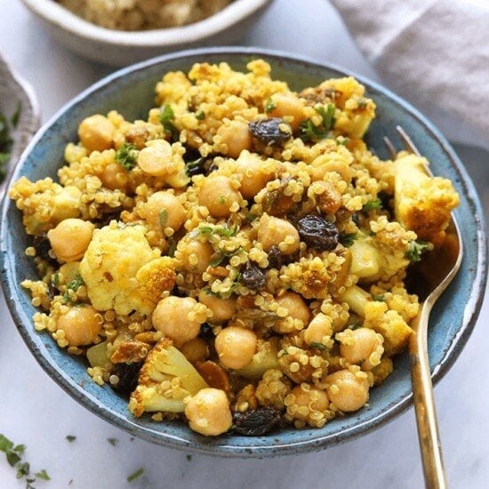 a bowl of couscous with golden roasted cauliflower.