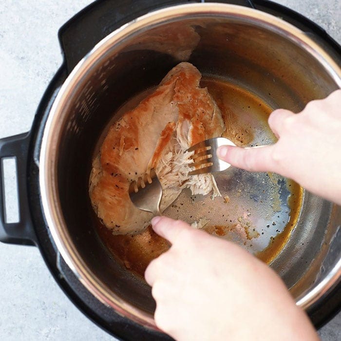 This easy shredded chicken in the Instant Pot recipe is ready in only 8 minutes, and will easily become a meal-prep staple in your home. Season with your favorite spices or sauce and you'll be on your way to an easy and delicious meal. Shredded chicken