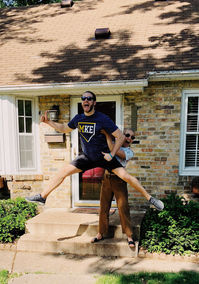 Fit Foodie Finds bought a house! Lee and Mark in front of house