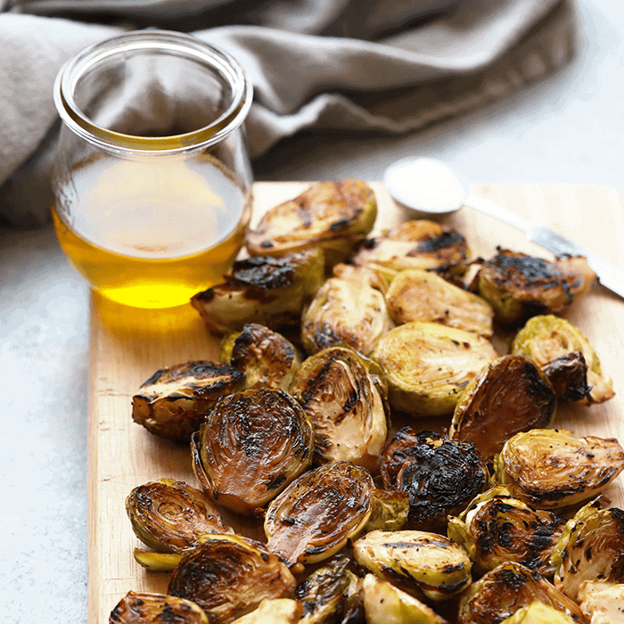 This Grilled Brussel Sprouts Recipe is perfect for a quick and easy weeknight dinner side or meal-prep for the week! You can use this recipe for grilled brussel sprouts, roasted brussel sprouts, or baked brussel sprouts. They are coated in balsamic, olive oil, and savory spices. Make them now!