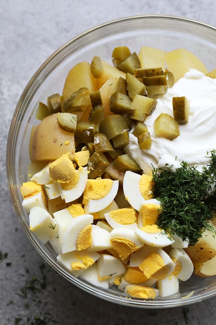 Ingredients for the potato salad in a bowl.