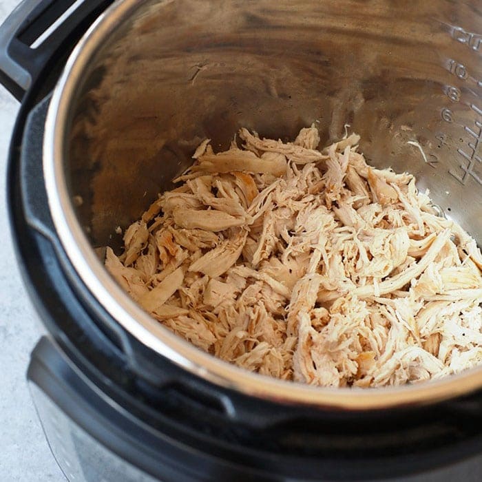 This easy shredded chicken in the Instant Pot recipe is ready in only 8 minutes, and will easily become a meal-prep staple in your home. Season with your favorite spices or sauce and you'll be on your way to an easy and delicious meal. shredded chicken