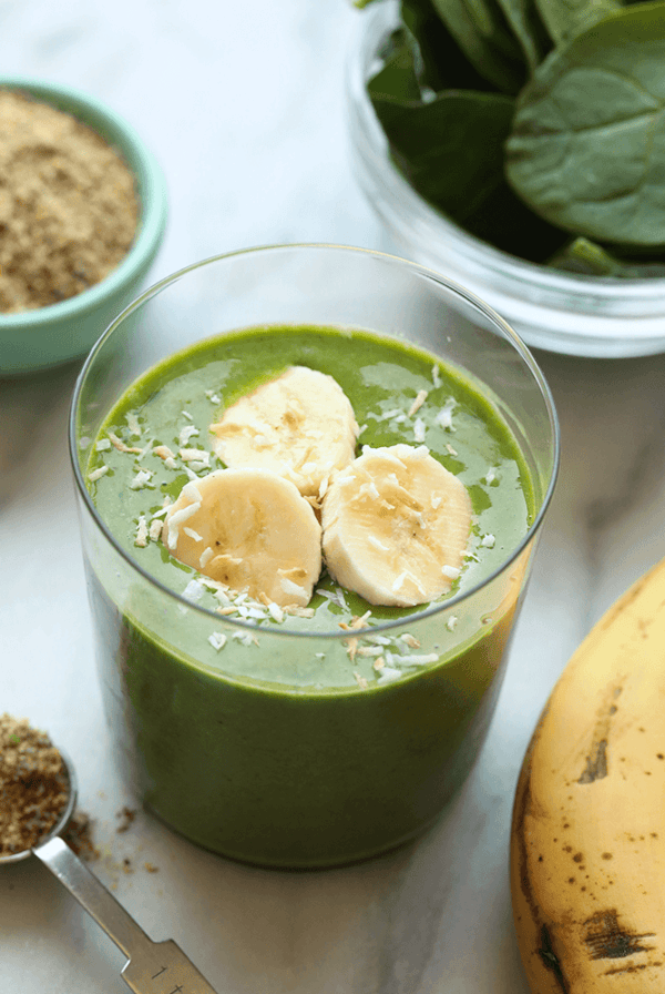 a matcha smoothie with bananas and spinach.