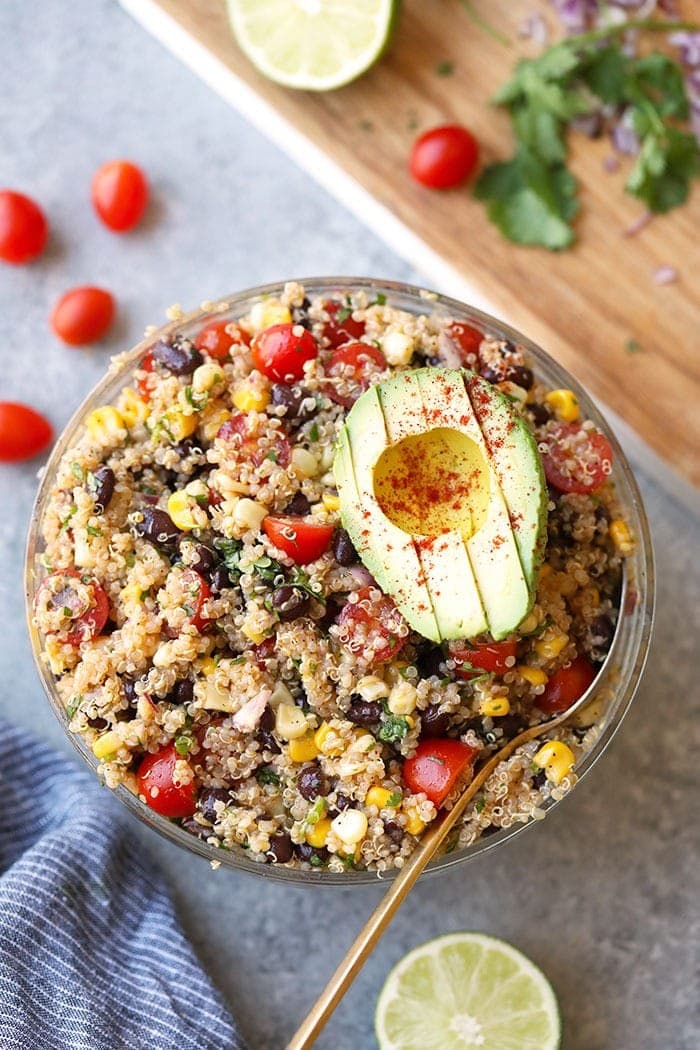 mexican quinoa salad in bowl with avocado
