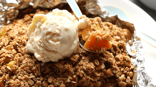 a foil pack with a scoop of ice cream and a bowl of granola.