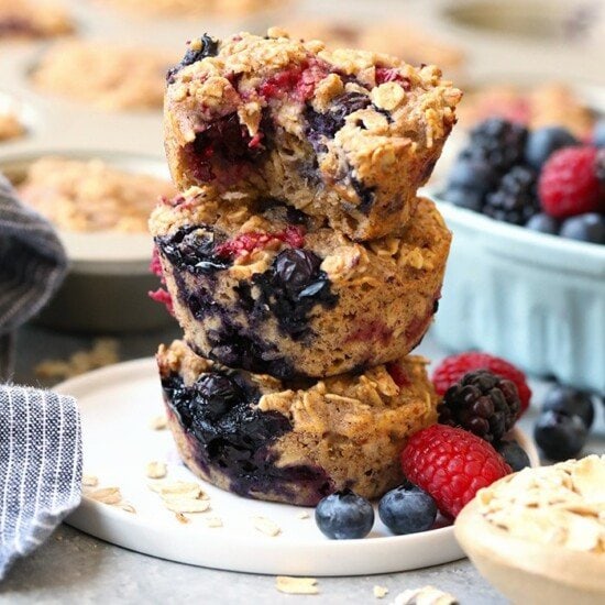 triple berry oatmeal cups stacked on a plate