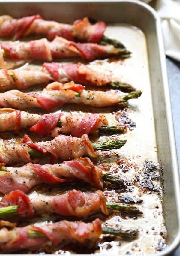 a sheet pan of bacon wrapped asparagus