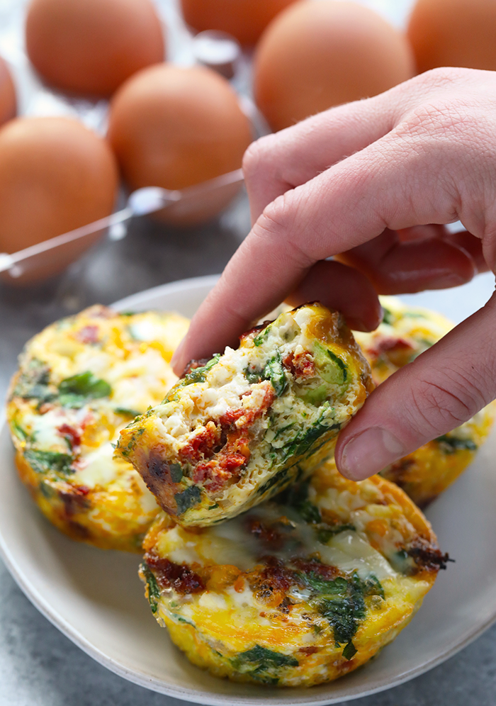 These Spinach and Sun-Dried Egg Cups are the perfect healthy breakfast, healthy snack, and everything in between. Just place all the ingredients into a muffin tin, pour in the eggs, and bake! egg cups