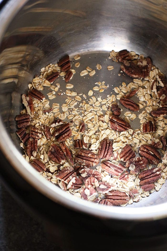 Oats and pecans ready to be toasted in the Instant Pot
