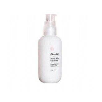 a bottle of cleanser on a white background.