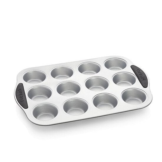 A 12-hole muffin pan on a white background.