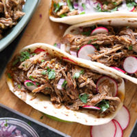 Is there anything better than fall off the bone pork carnitas tacos? Learn how to make the most delicious and juicy Instant Pot Carnitas recipe with a few simple ingredients.