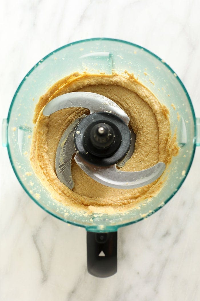 Garbanzo beans and cashew butter mixed up in a food processor