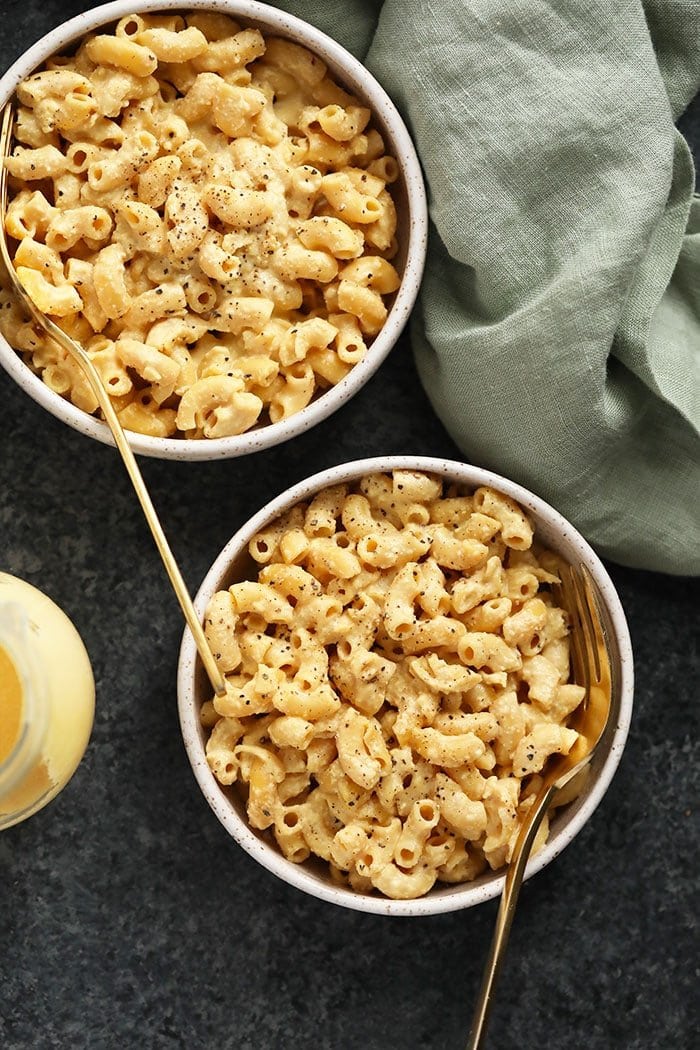 bowls of vegan mac and cheese ready to eat